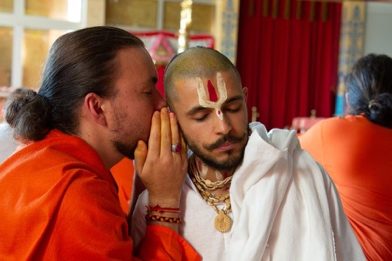 A Swami blessing a devotee